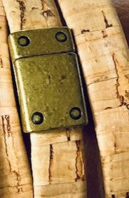 Metal clasp on cork wrap bracelet.
