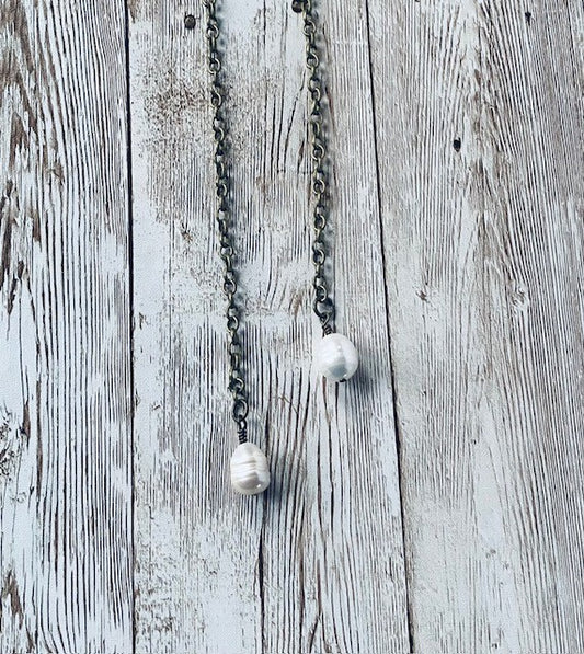 Necklace with fresh-water nugget beads on dark gold chain.