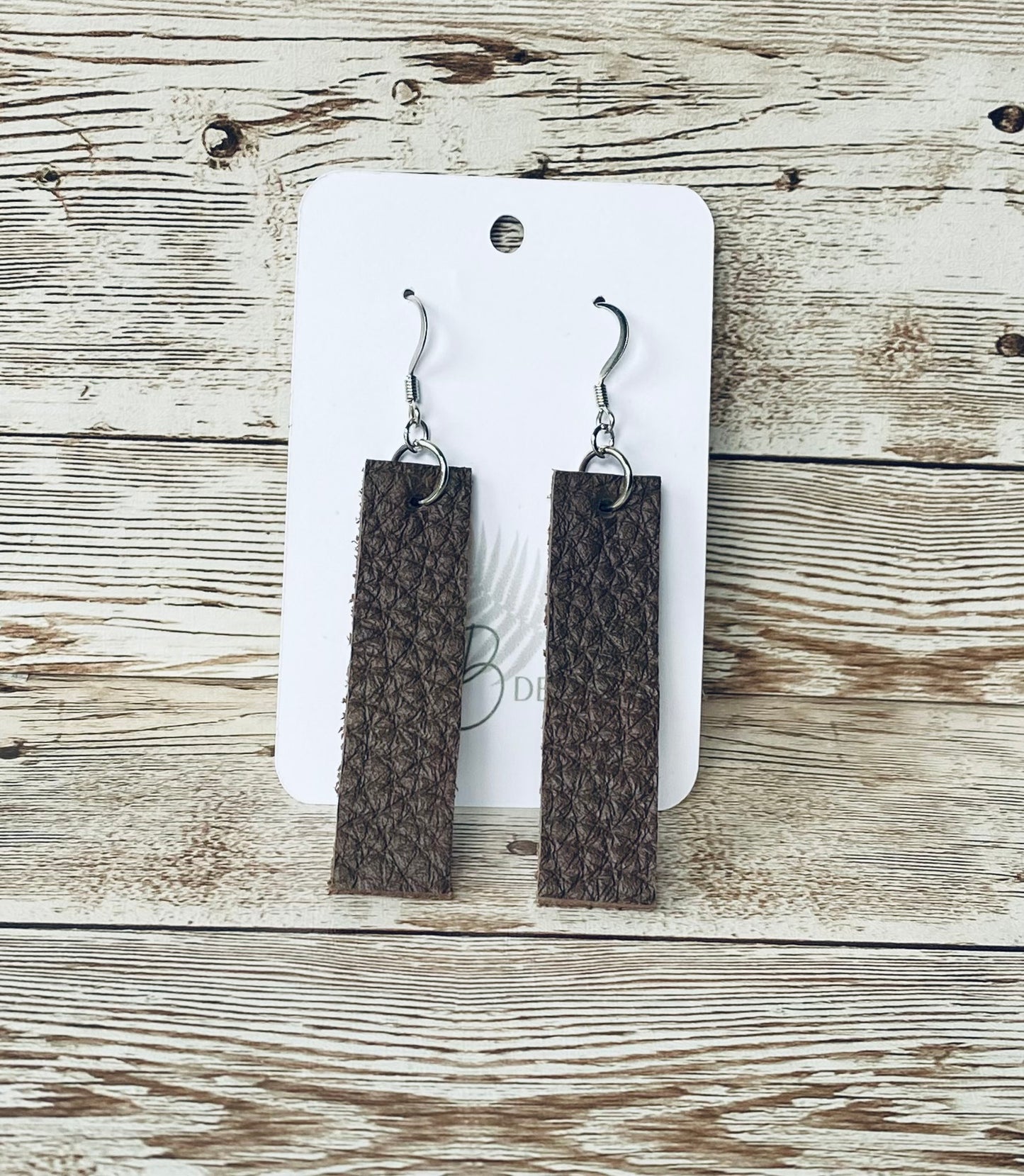 Brown suede long rectangular earring on bronze earring wire.