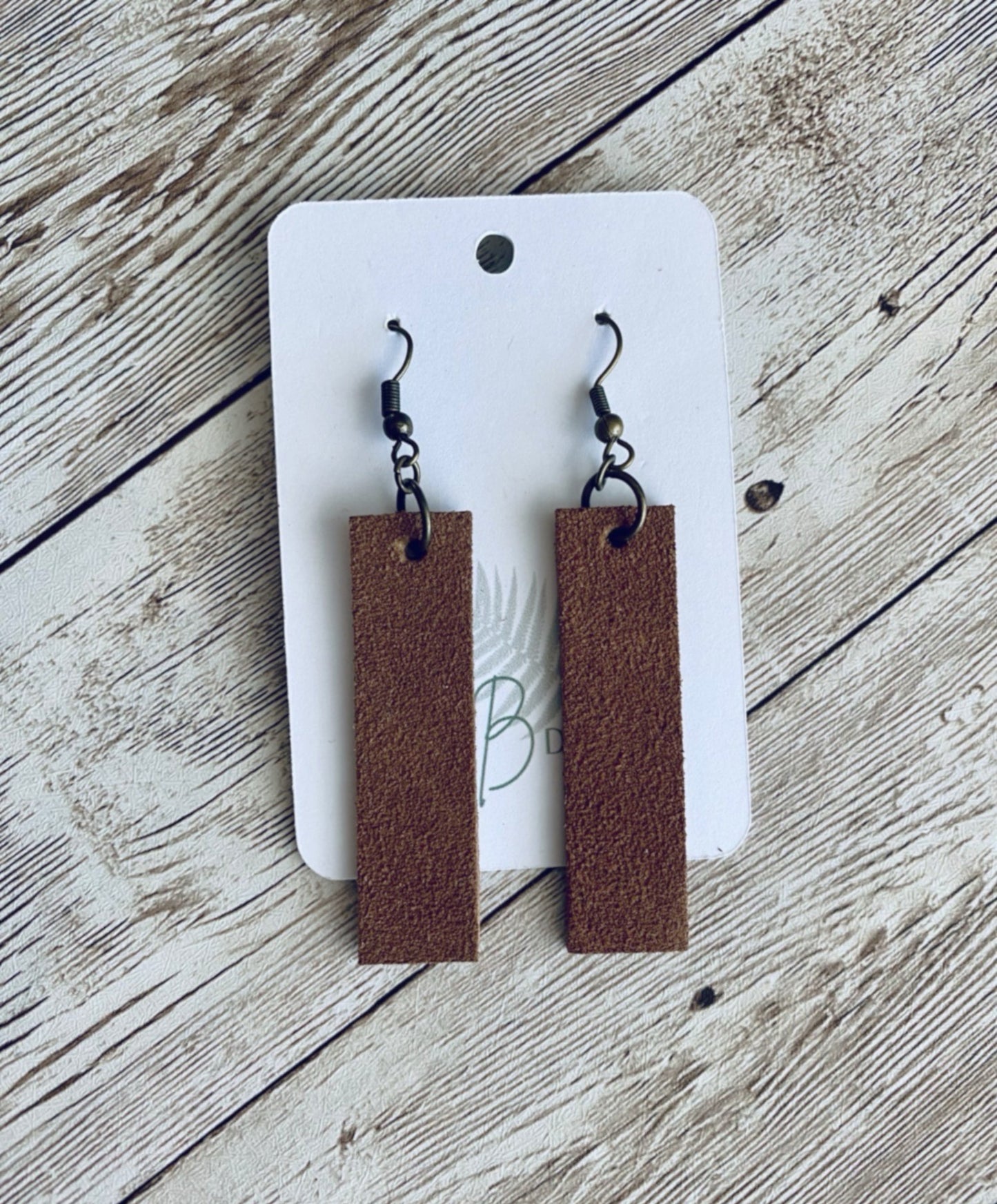 Brown suede long rectangular earring on bronze earring wire.